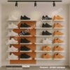 Floating Dual-Column Shoe Display Rack with White Shelves and Track Lights